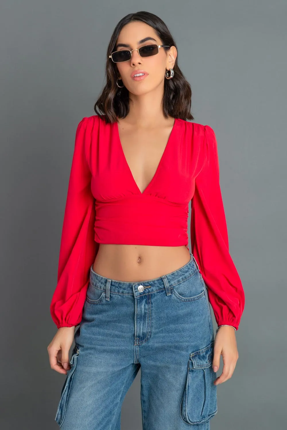 Blusa de manga larga abullonada plisados laterales